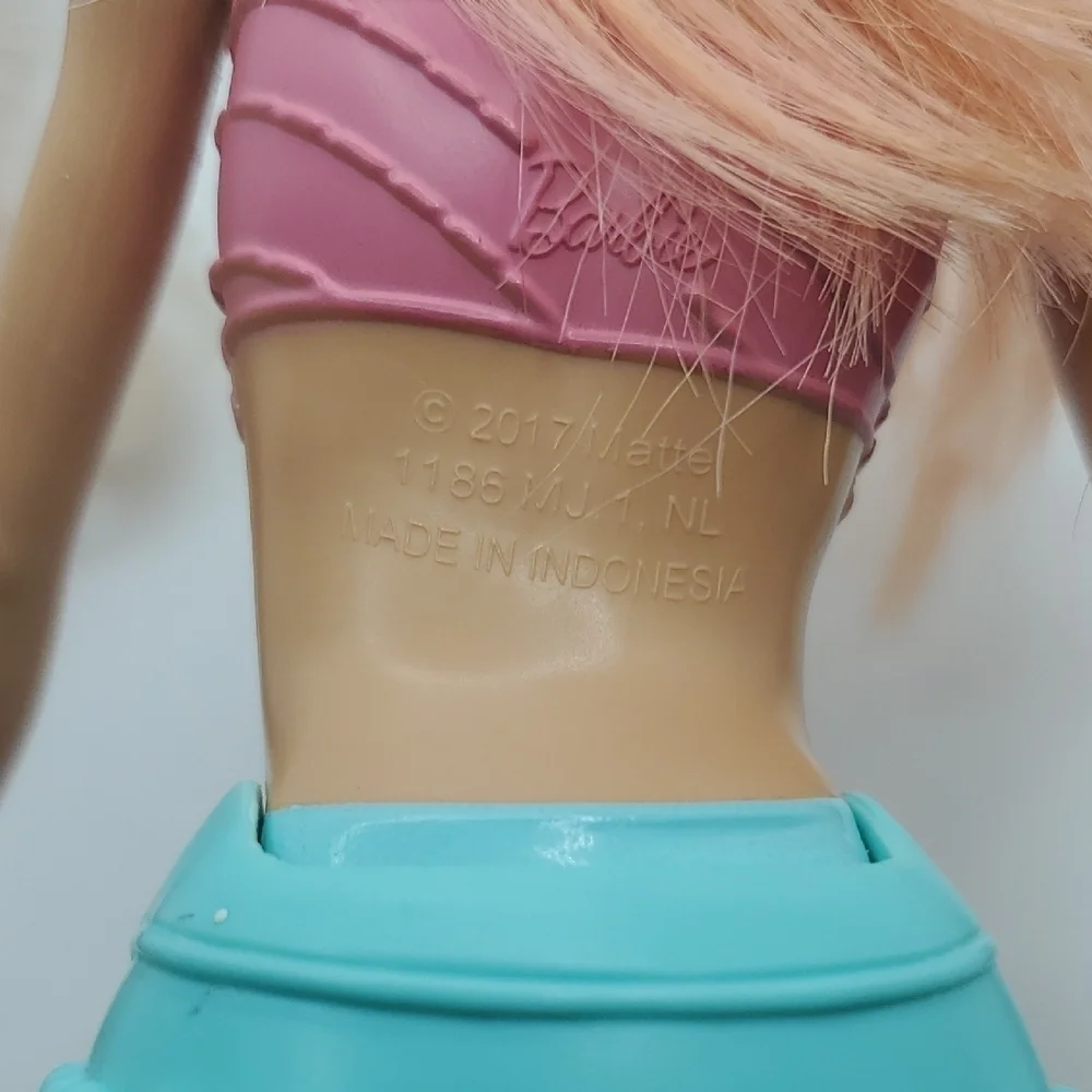 Mattel Dolls with Blonde Hair and Colorful Outfits